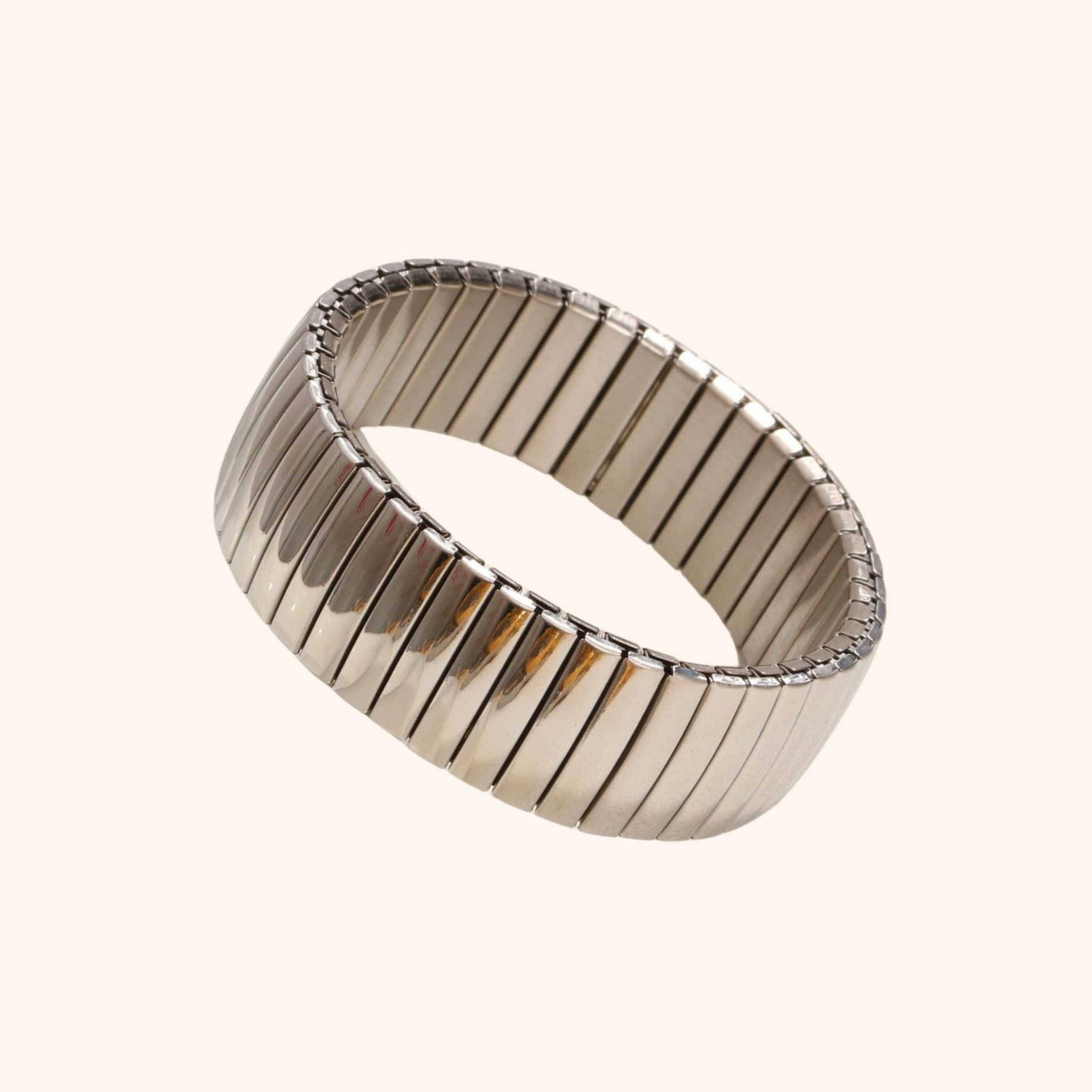 18mm wide 18k gold stretch bracelet with smooth high-shine finish and ribbed texture in polished stainless